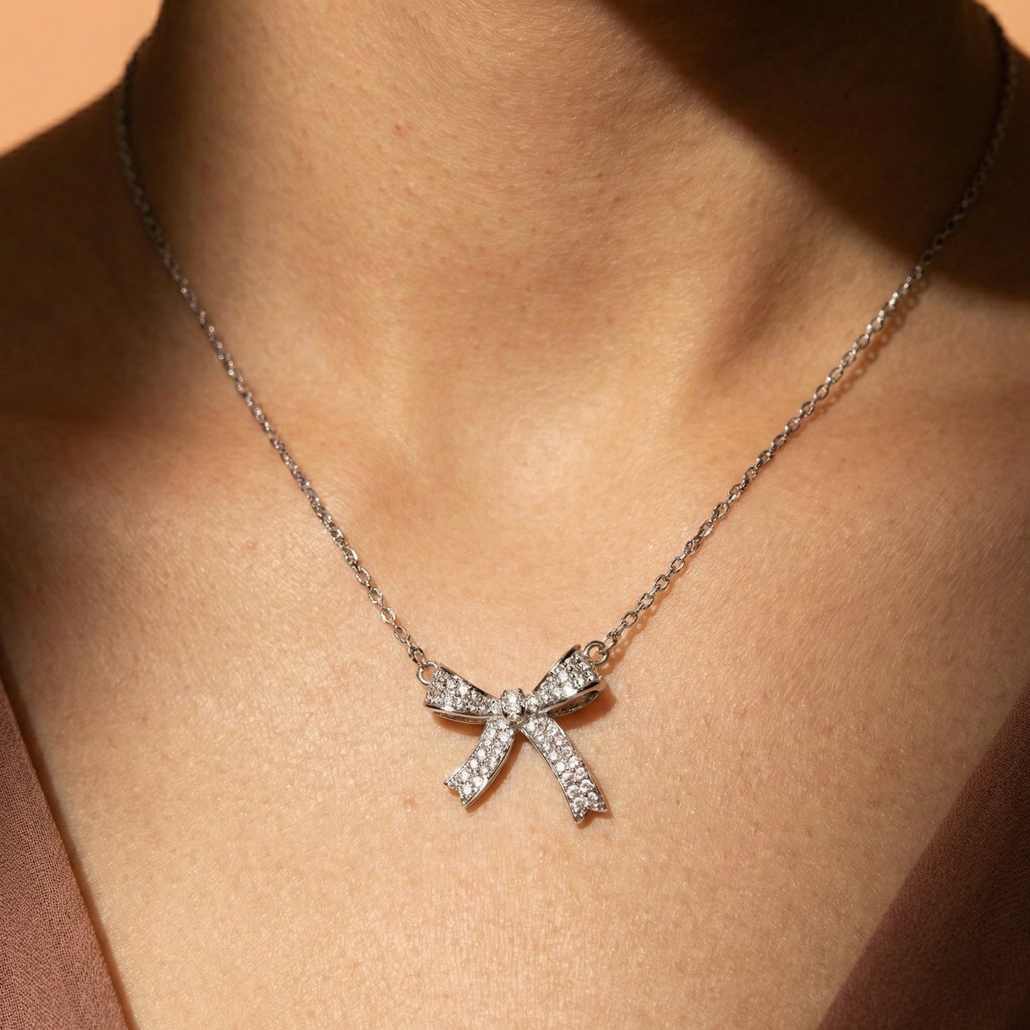 Zaraab Silver Crystal Bow Necklace